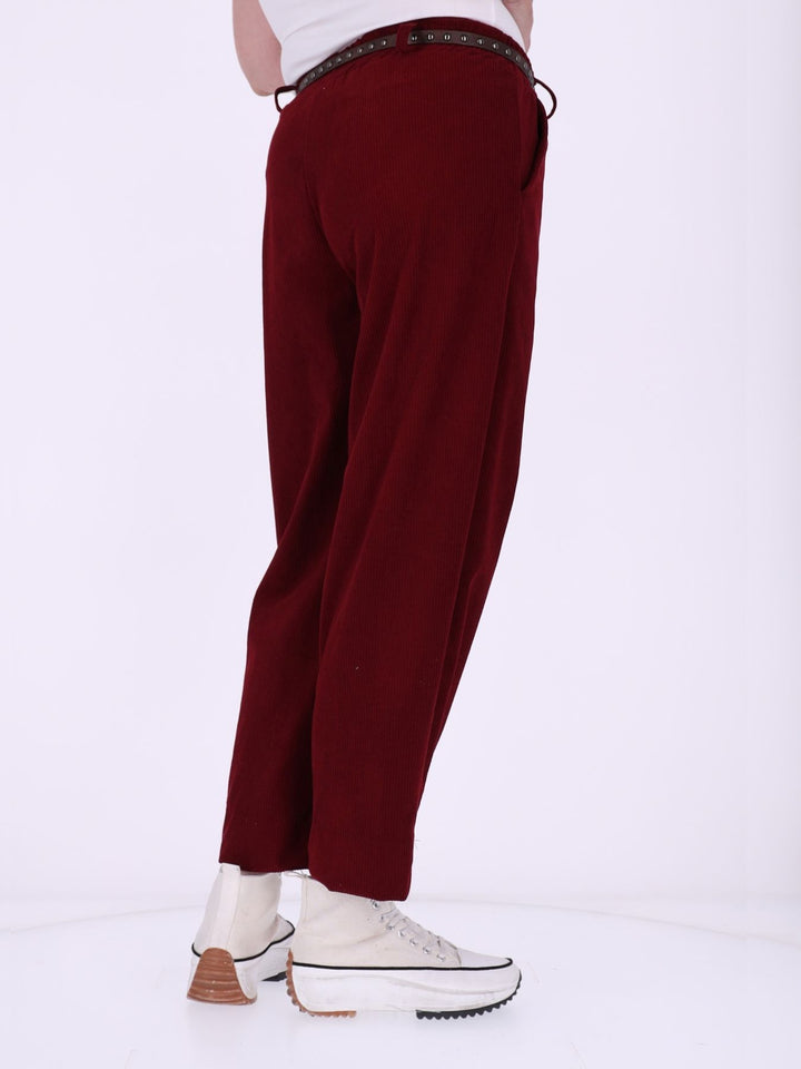Cordhose Jogger Nietengürtel elastischer Beinabschluss