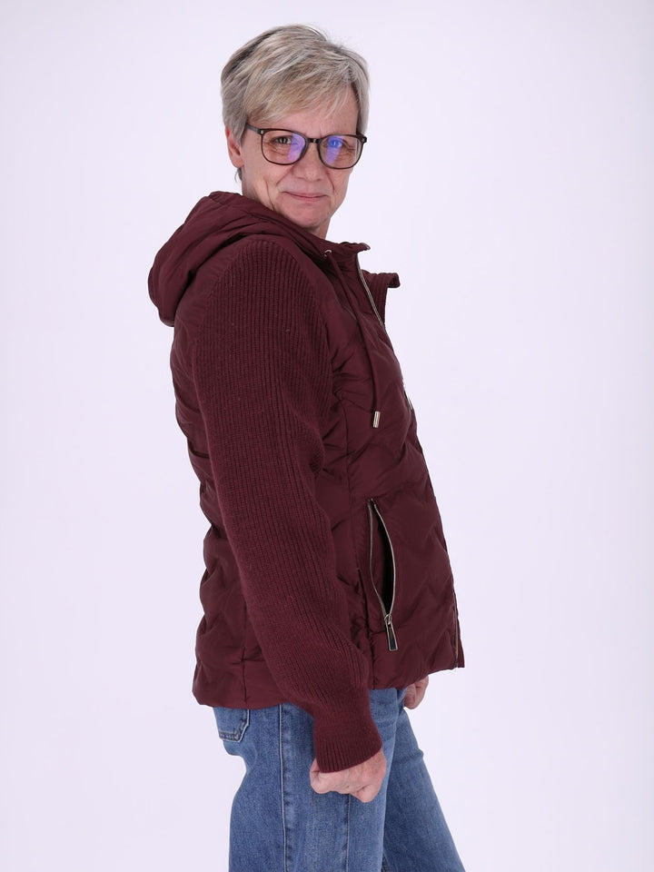Damen Steppjacke mit Strickärmeln und Reißverschluss – sportlich & modern