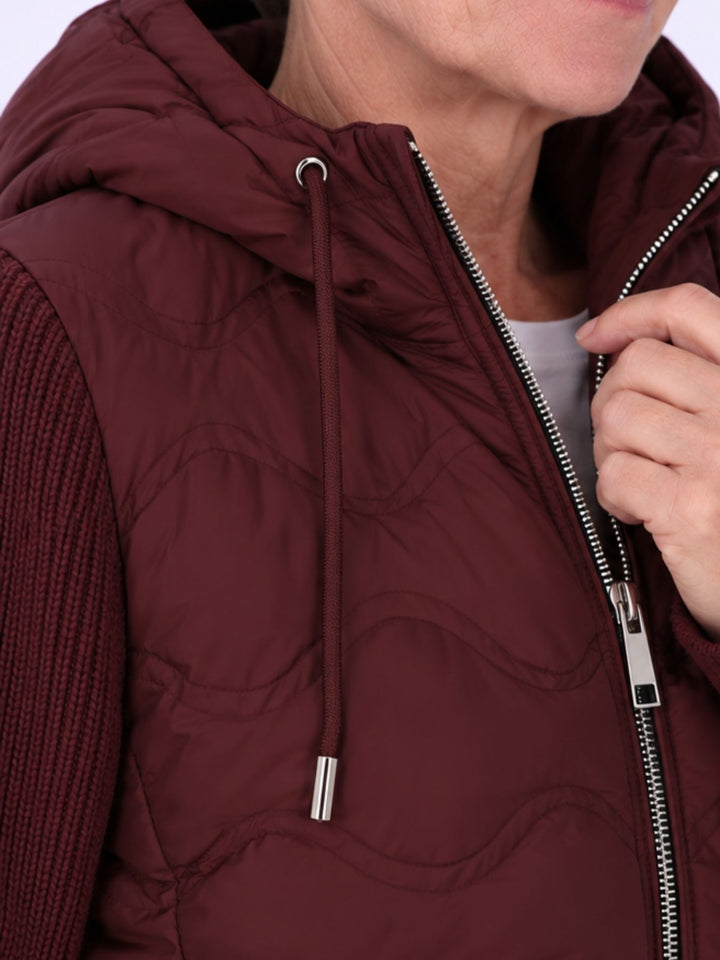 Damen Steppjacke mit Strickärmeln und Reißverschluss – sportlich & modern