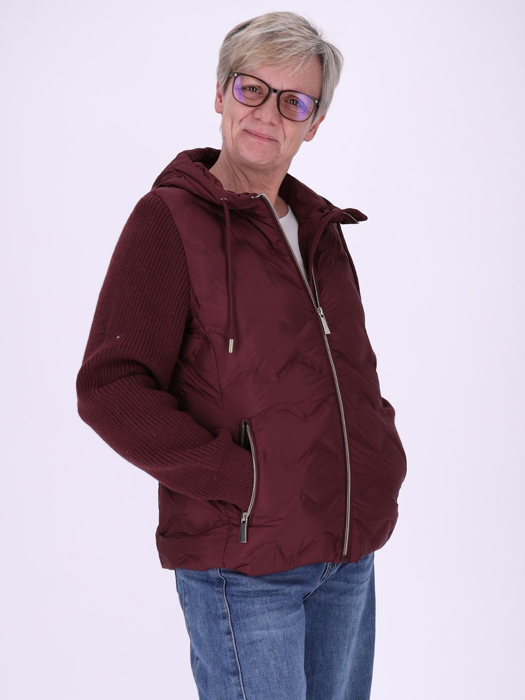 Damen Steppjacke mit Strickärmeln und Reißverschluss – sportlich & modern
