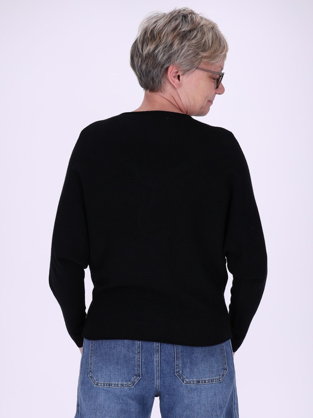 Schwarzer Damen Strickpullover mit Fledermausärmeln – elegant, weich & modern
